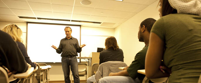 Pictured is Associate Professor Ed Travesari teaching in the classroom. | Photo by Ian Bradshaw