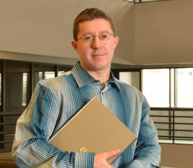 Pictured is William Constant, an information technology alumnus and ETL Load Production Support Analyst for FiServ, Inc. | Photo by Jim Judkis