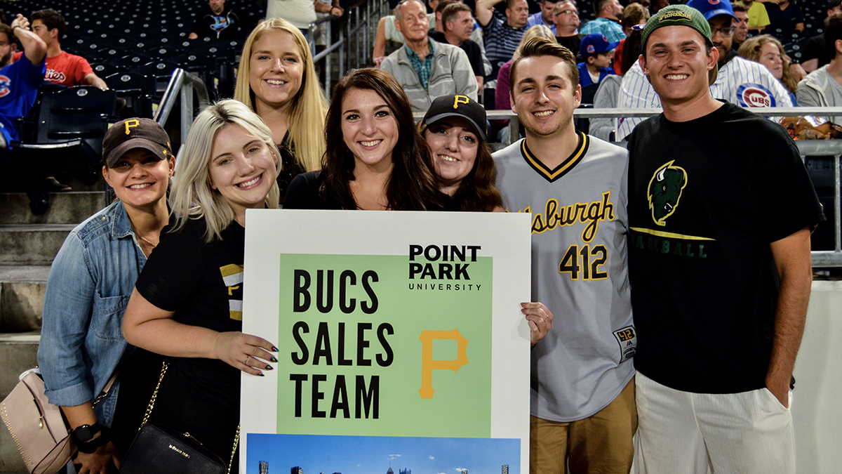 SAEM majors (left to right) Miranda Klein, Megan Greeley-Erwin, Maddie Winger,  Jill Svonavec, Mikayla Torrence,  Justin Joyce and Easton Klein sold tickets to the Point Park Pittsburgh Pirates Game Night at PNC Park. They represented 11 Point Park students who were members of the Bucs Sales Team.