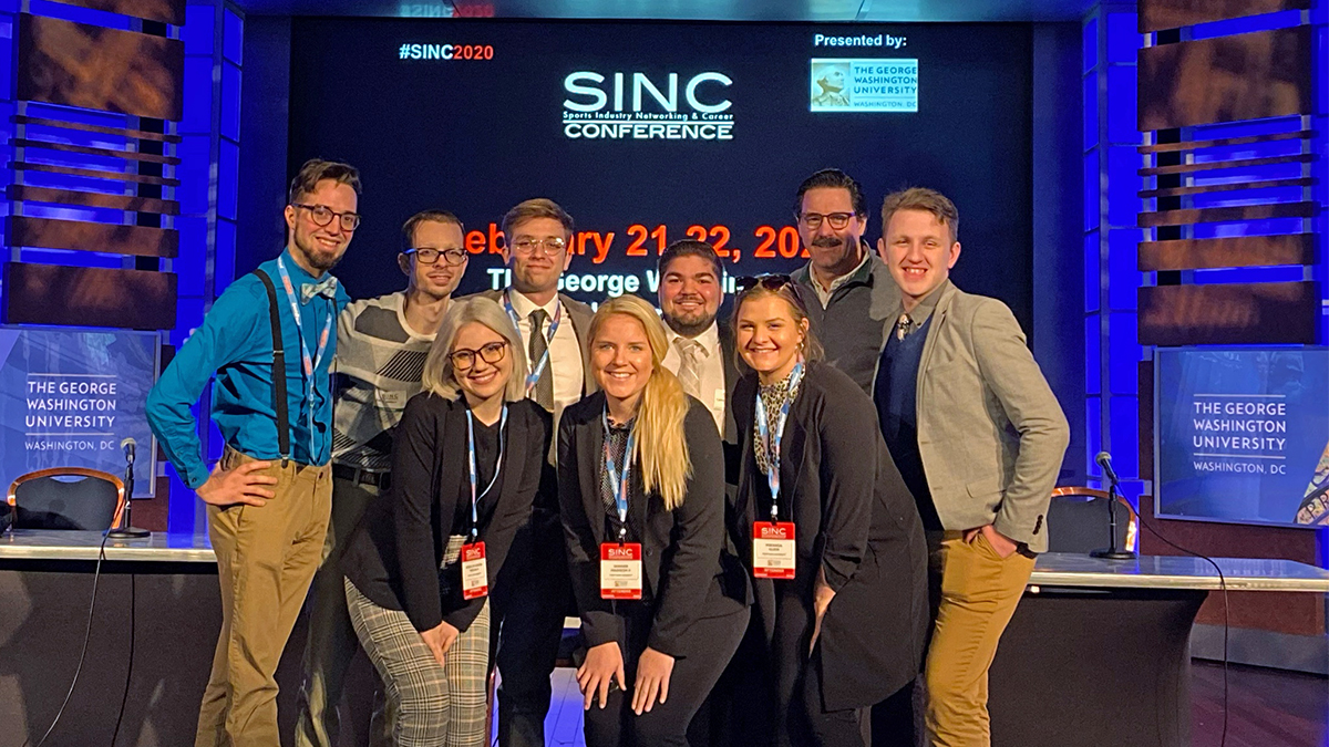 At the 2020 Sports Industry Networking and Career (SINC) Conference at George Washington University, pictured left to right (back row) are Jevin Fluegel, Zach Munich, Mitchum Donatelli, Connor Pasquerelli, Associate Professor Robert Derda and Jeremiah Rolon and left to right (front row) are Megan Greeley-Erwin, Maddie Winger and Miranda Klein.