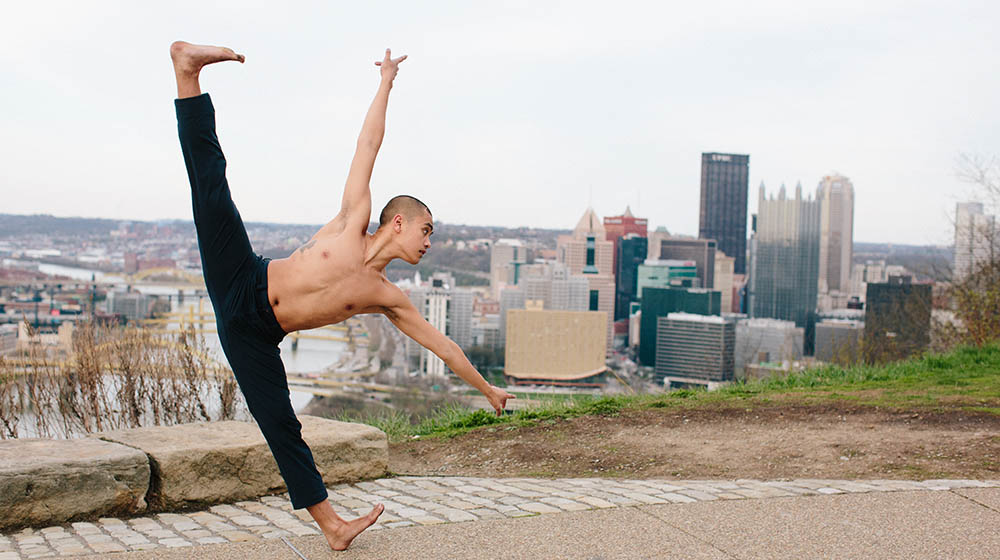 A dance student poses on Mt. Washington. Photo | Katie Ging
