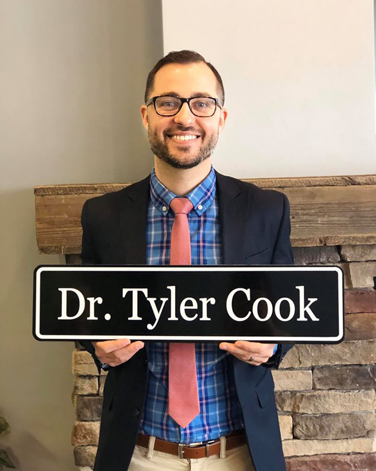 Pictured is Ed.D. grad Dr. Tyler Cook.