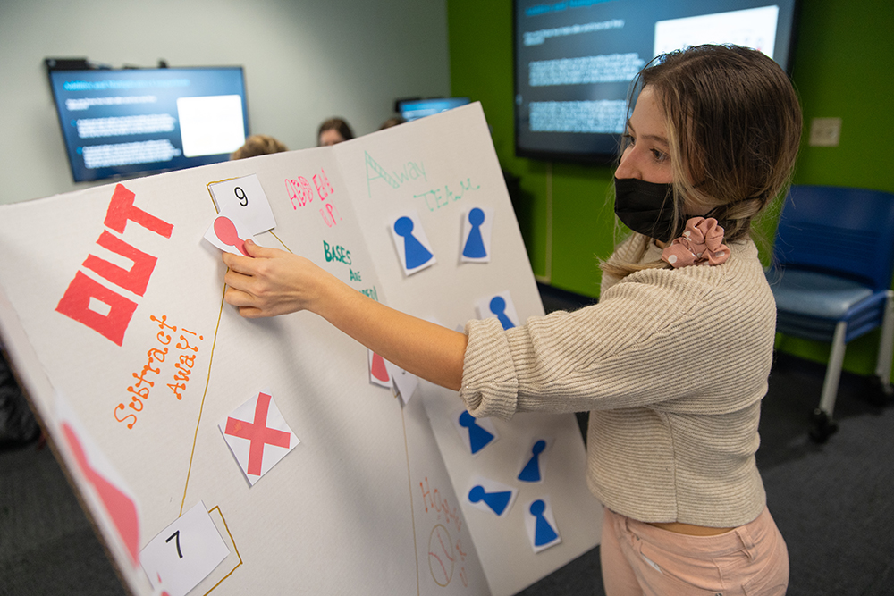A student works on a lesson plan project in Point Park's Matt's Maker Space Lab. Photo by Randall Coleman.