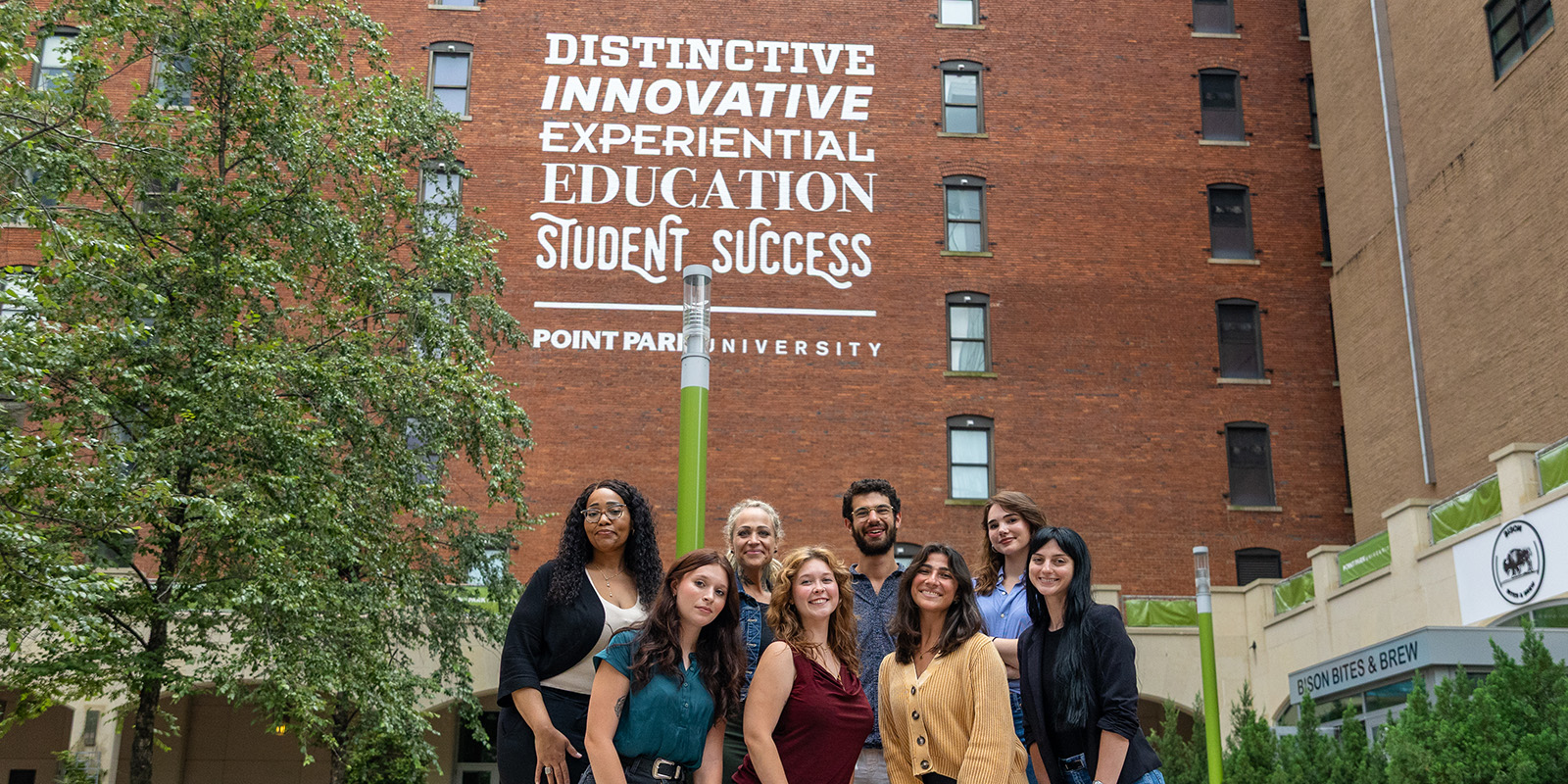 Students from the 2026 cohort of Point Park University's psychology doctoral program stand in Village Park. Photo by Paul Koontz.