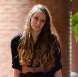 Pictured is Sara Payne, a journalism and global cultural studies double major who interned for the Downtown Community Development Corporation. | Photo by Chris Rolinson