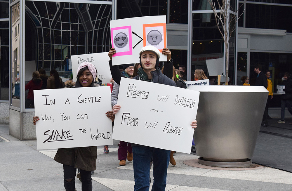 Pictured are Point Park students doing a peaceful protest in Downtown Pittsburgh. Photo by Gracey Evans.