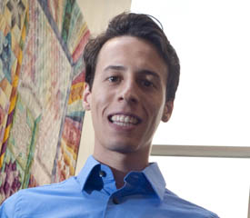 Pictured is global cultural studies alumnus Eric Probola.