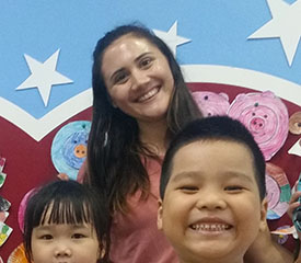 Pictured is Robyn Roux with her students in Vietnam. Photo submitted by Roux.