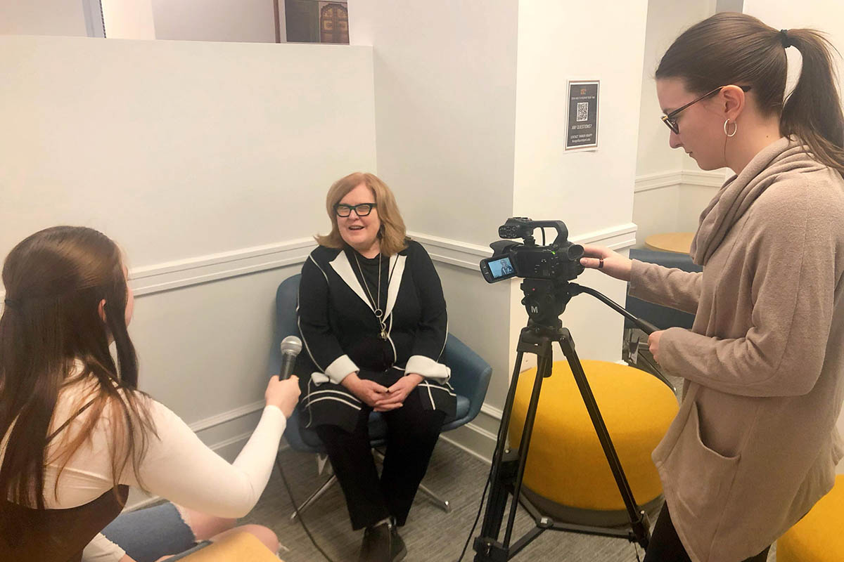 UView students interview Kathy Buechel, executive director of the Benter Foundation, a funder for the Downtown Pittsburgh Media Hub.
