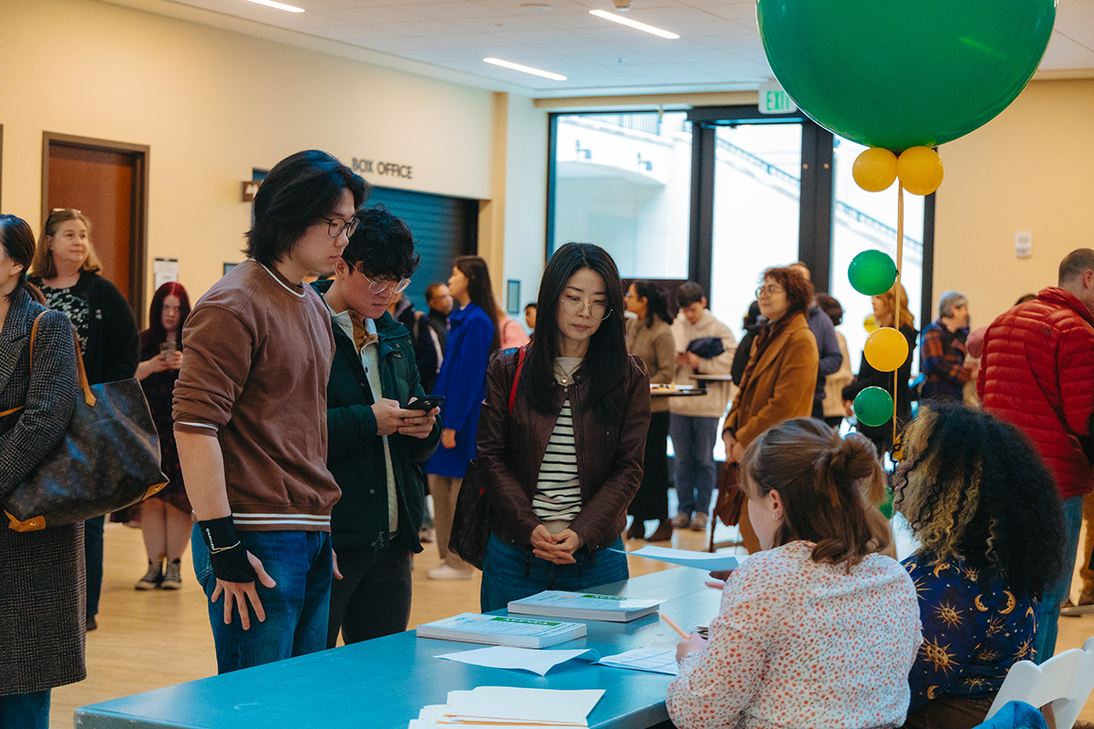 Pictured are students and families gathering at the 2024 Scholastic Writing Awards. Photo by Ethan Stoner.