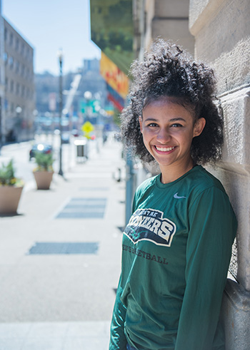 Pictured is a Point Park student standing on the Boulevard of the Allies.