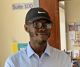 Pictured is Louis Schoen, political science major and Lead Intern of Office Operations, "The People's Office" Represented by Jake Wheatley Jr.
