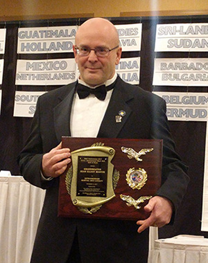 Pictured is Sean Elliot Martin, Ph.D., lecturer for the Department of Criminal Justice and Intelligence Studies and online director of the intelligence and national security program at Point Park University, at the Eastern USA International Martial Arts Association Black Belt Hall of Fame. | Photo submitted by Martin
