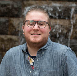 Pictured is Andrew Rauluk, a post-baccalaureate in secondary education biological sciences student at Point Park and volunteer for the Neighborhood Learning Alliance. | Photo by Victoria A. Mikula