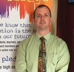 Pictured is Scott Manns, elementary education alumnus and K-12 curriculum, instruction and assessment coordinator for Pittsburgh Public Schools. | Photo by Amy Manns