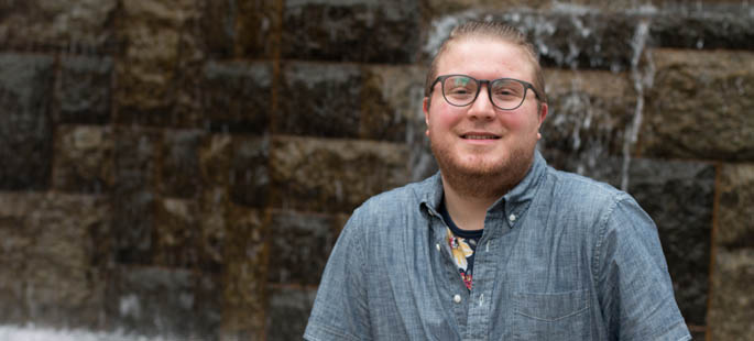 Pictured is Andrew Rauluk, a post-baccalaureate in secondary education biological sciences student at Point Park and volunteer for the Neighborhood Learning Alliance. | Photo by Victoria A. Mikula