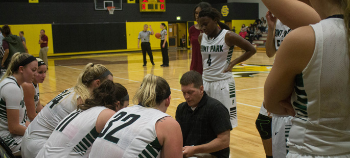 Pictured is head coach Tony Grenek with the Point Park women's basketball team. | Photo by Chris Squier