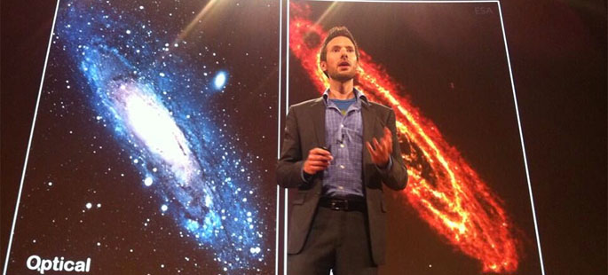 Pictured is Brendan Mullan, Ph.D., assistant professor of physics, presenting at the National Geographic headquarters. | Photo submitted by Mullan