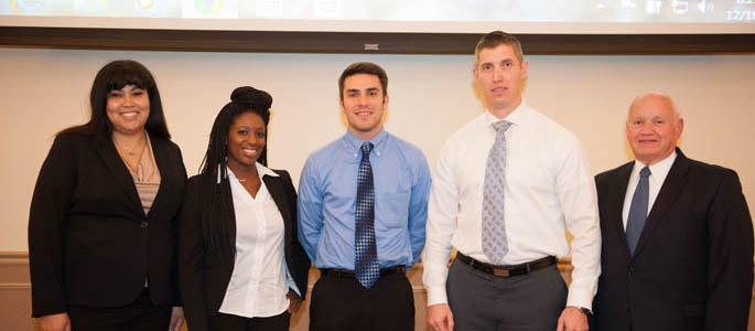 Pictured are students in the criminal justice administration 2015 graduate capstone seminar course. | Photo by Chris Rolinson