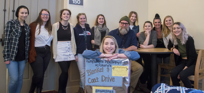 Pictured are members of the Confluence Psychology Alliance with Professor Robert McInerney, Ph.D. | Photo by Shayna Mendez