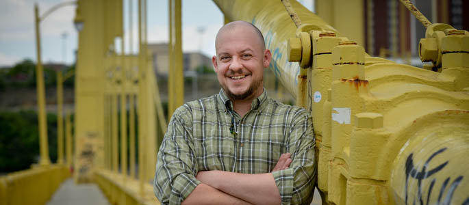 Pictured is Kevin Gallagher, M.A. in clinical-community psychology alumnus and supervisor for Pittsburgh Mercy's Operation Safety Net. | Photo by Jim Judkis