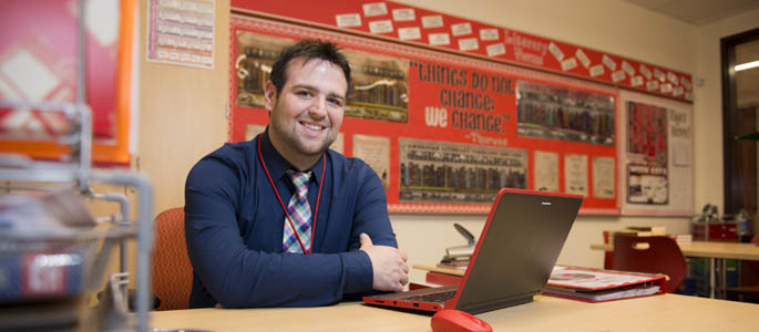 Pictured is Robert Michael, a 2014 secondary education English alumnus, curriculum and instruction graduate student and English/special education teacher at Moon Area High School. | Photo by Chris Rolinson