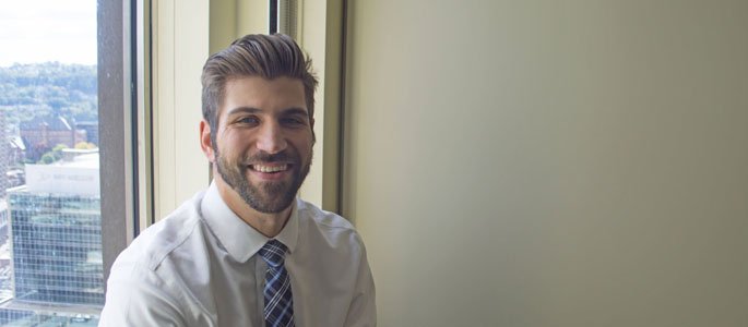 Pictured is Benjamin Eonta, M.B.A. graduate and lead operations analyst for UPMC Health Plan. | Photo by Shayna Mendez