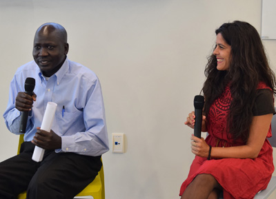 Pictured is Sudanese refugee and School of Business alumnus Panther Bior with Helena Knorr, Ph.D., associate professor of organizational leadership at Point Park. | Photo by Gracey Evans