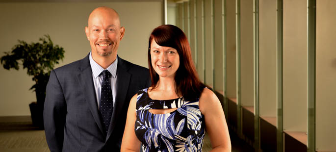 Pictured is Christian Carmody, School of Business instructor, senior vice president of the information services division at UPMC and president of Clinical Connect Health Information Exchange and Erika Jones, IT alumna and compliance analyst for Clinical Connect. | Photo by Jim Judkis