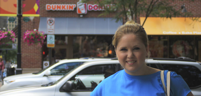 Pictured is business management alumna Chelsea Halker, Marketing and Guest Services Manager for Dunkin' Donuts. | Photo by Tanner Knapp