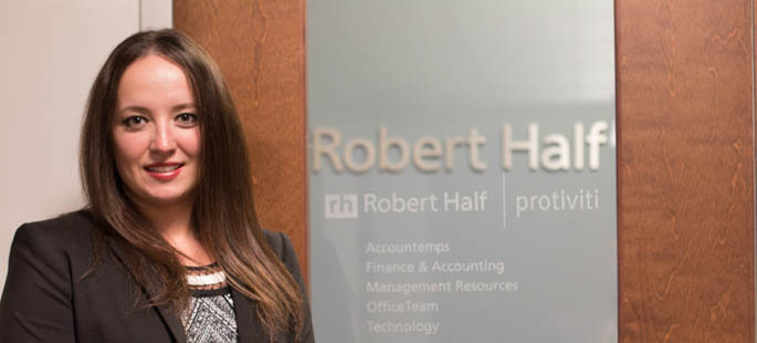 Pictured is Daria Opekunova, a native of Russia, M.B.A. alumna and staffing manager for Robert Half International. | Photo by Victoria A. Mikula