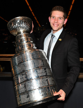 Pictured is SAEM alumnus Evan Schall, new media coordinator for the Pittsburgh Penguins with the 2017 Stanley Cup. | Photo by Barb Pilarski