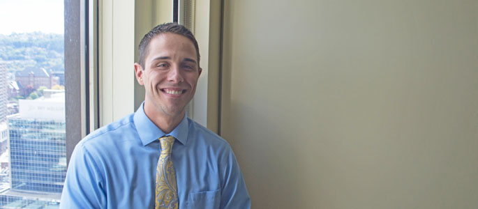 Pictured is M.B.A. graduate Joseph Veltri, manager of sales support and administration at UPMC Health Plan. | Photo by Shayna Mendez