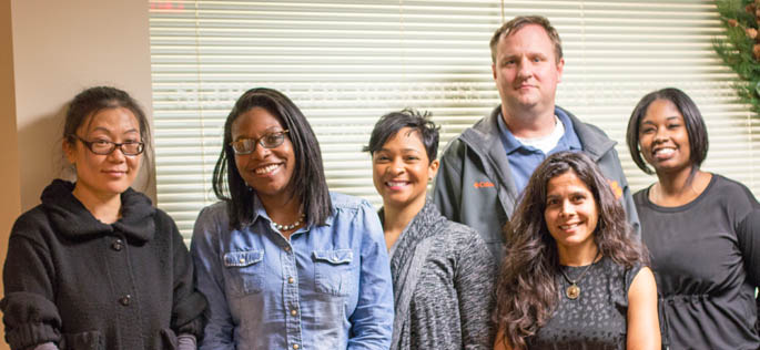 Helena Knorr, Ph.D., is pictured with students in her interpersonal communications class in the M.A. in leadership program. | Photo by Victoria Mikula