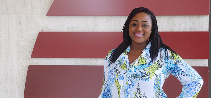 Pictured is M.B.A. alumna Patriece Thompson, investor relations manager for the Allegheny Conference on Community Development. | Photo by Brittany Bishop