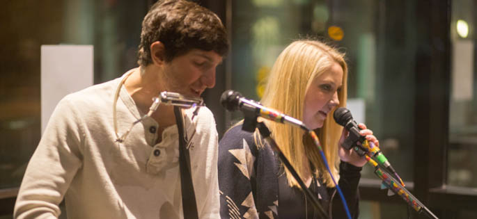 Pictured are Point Park students Chase Barron and Hannah Jenkins performing at Hundred Wood restaurant for a Pioneer Records event. | Photo by Connor Hochbein