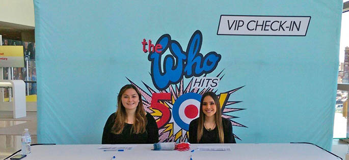 Pictured left to right are Haley Olah and Ericka Thomas at The Who concert VIP check-in table at the CONSOL Energy Center. | Photo submitted by Ed Traversari