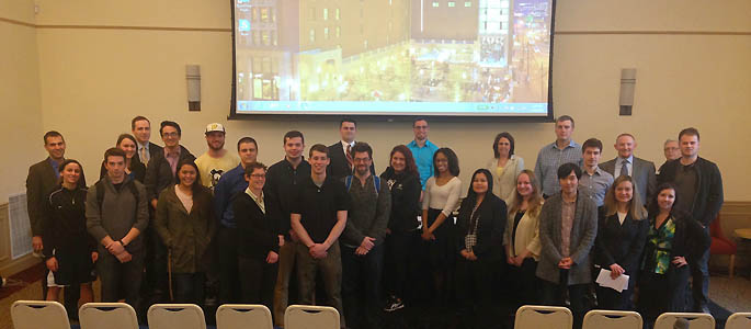 Pictured are Point Park students with accounting professionals from Schneider Downs. | Photo by Sarah Myskin