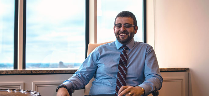 Pictured is Stoycho Stoychev, M.B.A. alumnus and Credit Management Report and Analysis Manager and 14-Q Corporate and CRE Loan Reporting Analyst for BNY Mellon. | Photo by Daniel Kelly