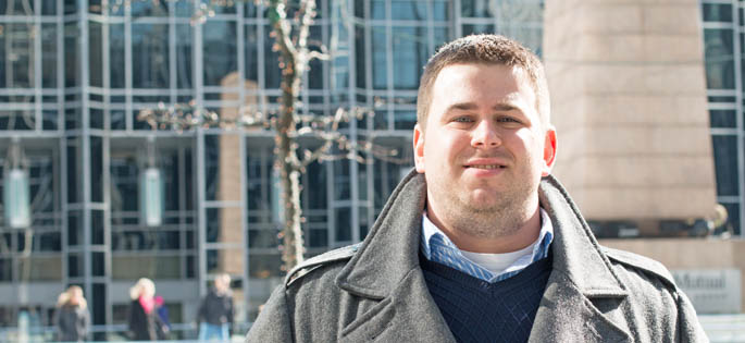 Pictured is M.B.A. alumnus Timothy Madden, a solutions developer for Deloitte Consulting, LLP. | Photo by Victoria A. Mikula