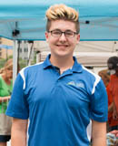 Pictured is Colten Gill, a junior sports, arts and entertainment management major and summer events intern for the Pittsburgh Downtown Partnership. | Photo by Victoria A. Mikula