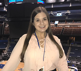 Pictured is SAEM alumna Dana Drewniak, ticket sales representative for the Orlando Magic. | Photo by Rachel Maddox