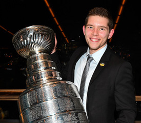 Pictured is SAEM alumnus Evan Schall, new media coordinator for the Pittsburgh Penguins with the 2017 Stanley Cup. | Photo by Barb Pilarski