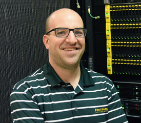 Pictured is public administration alumnus Jeff Gooch, desktop administrator and volunteer fire captain for Cranberry Township. | Photo by Gracey Evans