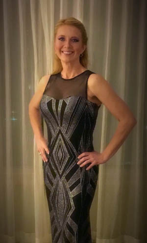 Pictured is Michele Langbein, Ph.D., modeling at Inspiring Lives International Gala. 