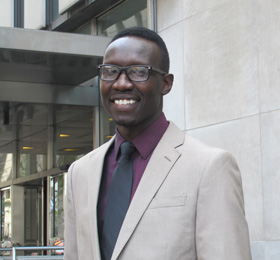 Pictured is Elvir Muslimovic, M.B.A. alumnus and supervisor of pricing operations at BNY Mellon. | Photo by Gracey Evans