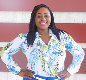 Pictured is M.B.A. alumna Patriece Thompson, investor relations manager for the Allegheny Conference on Community Development. | Photo by Brittany Bishop