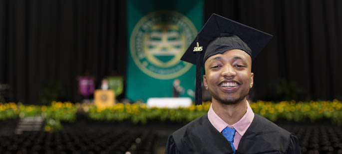 Pictured is cinema production graduate Lexx Truss at Point Park's 2015 commencement ceremony. | Photo by John Altdorfer