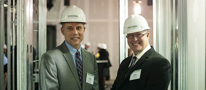 Pictured are Andrew Conte and Thom Baggerman, Ph.D. at the Center for Media Innovation's Hard Hot Tour May 5. Photo | Sarah Collins 