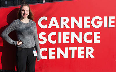 Pictured is public relations and advertising student Kariann Mano at the Carnegie Science Center. | Photo by Victoria A. Mikula
